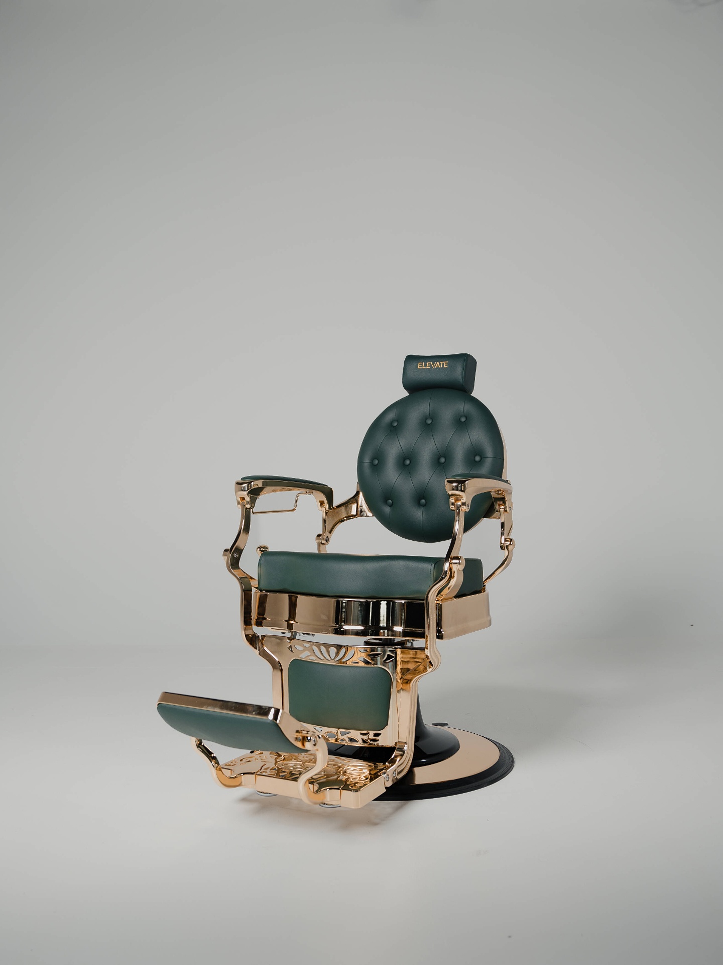 Signature green and gold Elevate barber chair